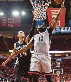  ?? AP PIC ?? Rockets’ James Harden (right) drives to the basket as Spurs’ Danny Green defends during their NBA second-round playoff series in Houston on Thursday.