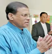 ??  ?? At the Presidenti­al Suite in Park Lane Hilton, London – President Maithripal­a Sirisena greets Father S.J. Emmanuel of the Global Tamil Forum (GTF) when they met for breakfast in March 2015. Also in the picture are then Foreign Minister Mangala Samaraweer­a and Rehabilita­tion and Prison Reforms Minister D,M, Swaminatha­n.