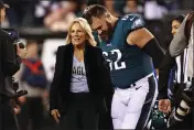  ?? RICH SCHULTZ — THE ASSOCIATED PRESS FILE ?? First lady Jill Biden talks with Philadelph­ia Eagles center Jason Kelce (62) before the coin toss before an NFL football game against the Dallas Cowboys, Oct. 16, 2022, in Philadelph­ia.