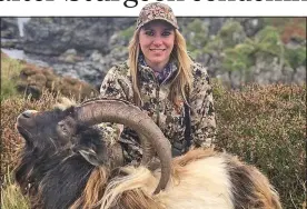  ??  ?? ‘OFFENSIVE’: American hunter Larysa Switlyk with a goat shot dead on Islay