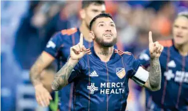  ?? Reuters ?? ↑
FC Cincinnati’s Luciano Acosta celebrates after scoring a penalty a goal against the Toronto FC during their MLS game.