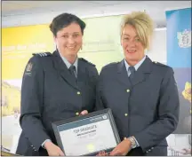  ??  ?? Director of Compliance Services Stephanie Rowe, left, with NAIT Compliance Officer Top Graduate, Cheryle Blight.