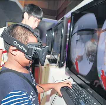  ?? SOMCHAI POOMLARD ?? Virtual reality on display at BIDC 2018.