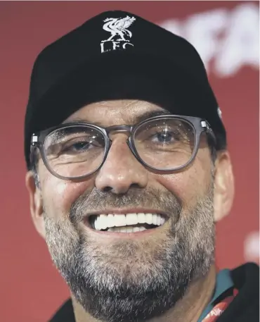  ??  ?? 0 Jurgen Klopp is all smiles in Qatar yesterday, but he’s not taking Flamengo lightly.