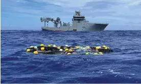  ?? Photograph: New Zealand police/New Zealand Defence Force ?? The 3.2 tonnes of cocaine floating in the Pacific Ocean that was recovered by New Zealand authoritie­s.