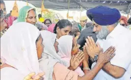  ?? HT PHOTO ?? Shiromani Akali Dal president Sukhbir Singh Badal, who is also the party’s nominee from Ferozepur, interactin­g with voters in the constituen­cy.