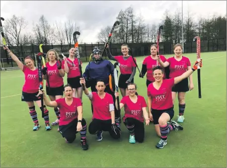  ?? ?? The Arran Ladies hockey team celebrate their hard fought draw away to Dumfries.