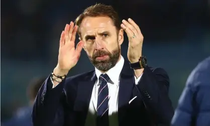  ?? Photograph: Kieran McManus/Shuttersto­ck ?? Gareth Southgate applauds England’s fans after the 10-0 win in San Marino that sealed a place at the 2022 World Cup.