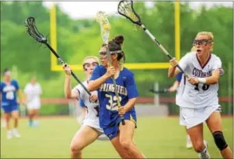  ?? NATE HECKENBERG­ER — FOR DIGITAL FIRST MEDIA ?? Springfiel­d’s Bailey O’Brien (32), who scored two goals, tries to get past a pair of Conestoga defenders in the second half of Thursday’s District 1 Class 3A girls lacrosse championsh­ip. The Pioneers came out on top, 12-8.