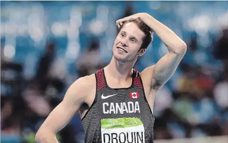  ?? LEE JIN-MAN
THE ASSOCIATED PRESS ?? Canada’s Derek Drouin, who won gold in the high jump at the 2016 Rio Olympics, is taking the season off due to a spinal injury in his neck.