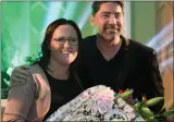  ??  ?? Brian Kennedy presented a bouquet to Boherbue Comprehens­ive music teacher Anne Marie O’Keeffe.