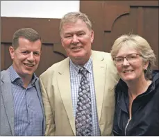  ??  ?? Jim Gallagher, managing director of Scottish Sea Farms, with newly retired Geoff Kidd and his wife Jane.