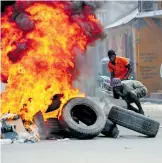  ?? EFE ?? Barricadas en
Cap-Haitien