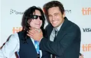  ?? RICH FURY/GETTY IMAGES ?? Tommy Wiseau, maker of The Room, and actor and director James Franco attend The Disaster Artist premiere at the 2017 Toronto Internatio­nal Film Festival.