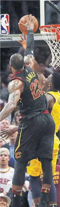  ?? GREGORY SHAMUS/GETTY IMAGES ?? There was no goaltendin­g call on LeBron James’ block on Victor Oladipo. James then dropped his 28-footer over Thaddeus Young to give Cleveland a 98-95 win.