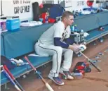  ?? THE ASSOCIATED PRESS ?? Atlanta Braves starting pitcher Sean Newcomb sits on the bench after losing his bid for a no-hitter in the ninth inning of Sunday’s game against the Los Angeles Dodgers in Atlanta.