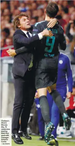  ?? REUTERSPIX ?? Chelsea’s Alvaro Morata (No. 9) celebrates scoring their first goal with manager Antonio Conte –