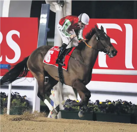  ?? Pawan Singh / The National ?? North America, ridden by Richard Mullen, delivered win No 2 on the night at Meydan for trainer Satish Seemar