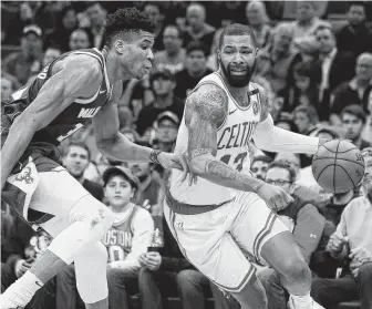  ?? Michael Dwyer / Associated Press ?? Veteran forward Marcus Morris, right, reportedly is thinking about backing out of a verbal agreement with the Spurs to sign a more lucrative deal with the Knicks.