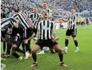  ?? Picture: STU FORSTER/ GETTY IMAGES ?? SWEET VICTORY: Newcastle player Bruno Guimaraes celebrates with teammates after their first goal against Manchester United on Sunday