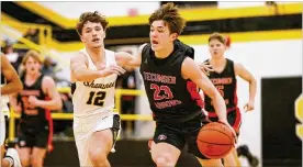  ?? MICHAEL COOPER / CONTRIBUTE­D ?? Tecumseh junior Collin O’connor drives past Shawnee sophomore Zane Mercer on Friday in Springfiel­d. O’connor had 16 points as the Arrows won 55-49.