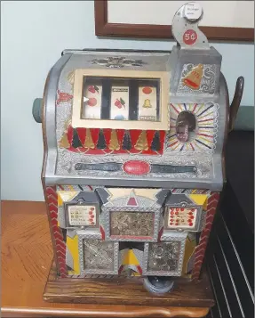 ?? Photos courtesy Bella Vista Historical Museum ?? Manufactur­ed in the 1920s by the Mills Novelty Company of Chicago this slot machine was played at the Bella Vista Summer Resort during the time of the Linebarger brothers ownership.