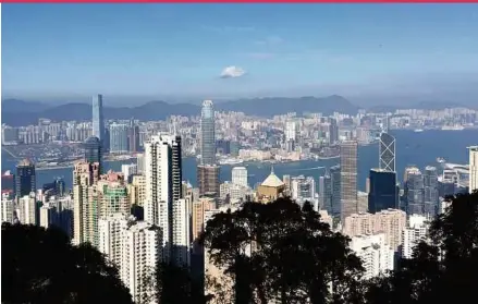  ??  ?? FROM LEFT: Victoria Peak - overlookin­g Victoria Harbour from the peak; Lantau Island - Hong Kong– Macau–Zuhai subsea tunnel and Ngong Ping 360 cable car.