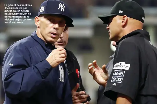  ?? PHOTO AFP ?? Le gérant des Yankees, Joe Girardi, n’a pas aidé la cause de son équipe, samedi, en ne demandant pas la révision d’un jeu controvers­é.