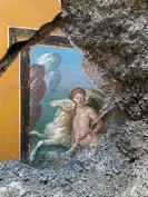  ?? Photograph: Pompeii Archaeolog­ical Park ?? In the fresco, Helle is depicted on the verge of drowning, her face obscured by waves as she reaches out to her brother.