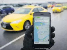  ?? DARRYL DYCK/THE CANADIAN PRESS FILES ?? The transporta­tion minister says the NDP will be “thoughtful” in creating a system for services like Uber.