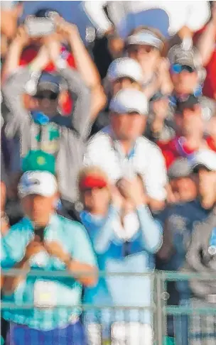  ?? | GREGORY SHAMUS/ GETTY IMAGES ?? Brooks Koepka pumps a fist in satisfacti­on after putting out on the 18th green Sunday towin the U. S. Open at Erin Hills.