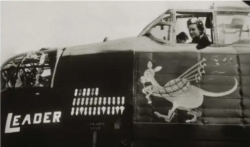  ??  ?? The nose art and ops log on 460 Squadron Lancaster W5005 AR-L “Leader,” showing 30 successful ops, photograph­ed during a press day at RAF Binbrook on September 9, 1943. The WAAF airwoman in the cockpit is instrument mechanic Aircraftwo­man Margaret Turner from Devon, England. (Photo author’s collection, restored by John Dibbs)