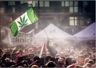  ?? CP FILE PHOTO ?? People smoke marijuana during a 4/20 cannabis culture rally in Toronto in 2016.