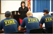  ?? NWA Democrat-Gazette/ANDY SHUPE ?? Valerie McDermott, Employee Assistance Program counselor for the University of Arkansas for Medical Sciences, speaks Thursday to a group of Fayettevil­le firefighte­rs to gather suggestion­s for what they want to discuss for an upcoming work session at...