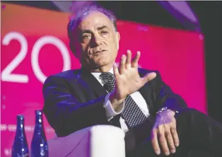  ?? ZACH GIBSON/BLOOMBERG FILES ?? Air Canada chief executive Calin Rovinescu believes Canada’s rules on travellers are “disproport­ionate” as the pandemic eases in many parts of the country.