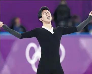  ?? Aris Messinis Getty Images ?? NATHAN CHEN, enraged by his disastrous short program a day earlier that eliminated him from medal contention, made Olympic history by cleanly landing five quadruple jumps in a program.