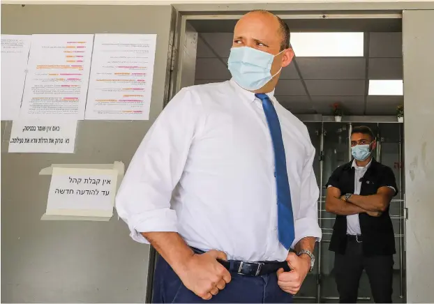  ?? (Marc Israel Sellem/The Jerusalem Post) ?? NAFTALI BENNETT stands outside Lod City Hall this week.