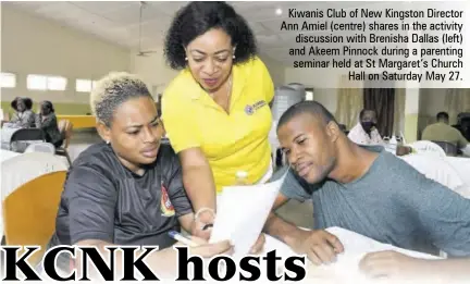  ?? ?? Kiwanis Club of New Kingston Director Ann Amiel (centre) shares in the activity discussion with Brenisha Dallas (left) and Akeem Pinnock during a parenting seminar held at St Margaret’s Church Hall on Saturday May 27.