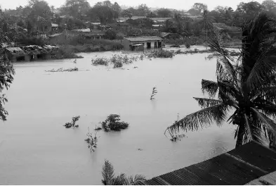  ??  ?? An aerial view of houses submerged in water in Pemba city on the northeaste­rn coast of Mozambique. Rains continued to pound Pemba and surroundin­g areas yesterday, causing massive flooding and destructio­n.