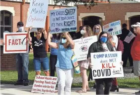  ?? TIM SHORTT/USA TODAY NETWORK ?? The Brevard County School Board in Florida voted 3-2 Aug. 30 to institute a 30-day policy requiring masks in public schools.