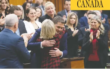  ?? ADRIAN WYLD / THE CANADIAN PRESS ?? Andrew Scheer is embraced by deputy House leader Candice Bergen after he announced he will step down as leader of the Conservati­ves Thursday.