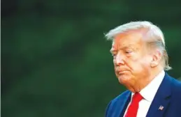  ?? AP PHOTO/PATRICK SEMANSKY ?? President Donald Trump walks on the South Lawn of the White House in Washington on Saturday.