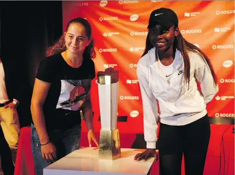  ?? JACK BOLAND ?? French Open champ Jelena Ostapenko, left, and Canadian Francoise Abanda are both 20 and came up the tennis ranks together.