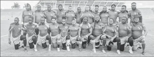  ?? ?? The ‘Green Machine’ poses for a team photo before their thrilling 24-23 win over Trinidad and Tobago at the Hasely Crawford Stadium in Port of Spain