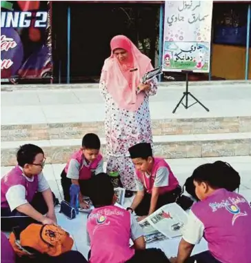  ??  ?? Seramai 250 orang murid Tahun 3 hingga Tahun 6 menyertai program Semarak Jawi.