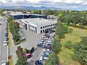  ??  ?? The land and buildings housing the head office of Harness Racing New Zealand and a software company have been placed on the market.