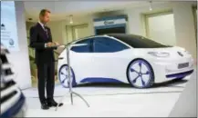  ?? THE ASSOCIATED PRESS ?? The head of Volkswagen core brand Herbert Diess speaks at a news conference Tuesday at the Volkswagen headquarte­rs in Wolfsburg, Germany.