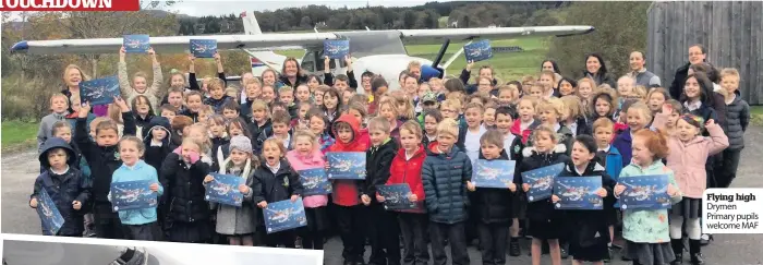  ??  ?? Flying high Drymen Primary pupils welcome MAF