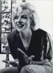  ??  ?? Marilyn Monroe, shown in her home about a month before she was found dead on Aug. 5, 1962.