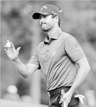  ?? CANADIAN PRESS FILE PHOTO ?? Canada’s Adam Hadwin reacts after a birdie on the eighth hole during the second round at the Masters golf tournament April 6 in Augusta, Ga. In a recent video posted to Instagram, Hadwin was preparing for this week’s British Open by hitting balls in...